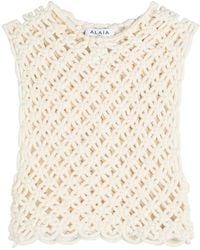 Alaïa - Knotted Cotton-Blend Crop Top - Lyst