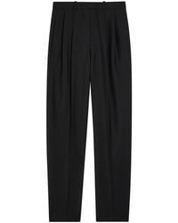 Givenchy - Pleated Tapered-Leg Wool And Mohair-Blend Trousers - Lyst