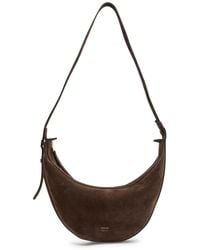 KHAITE - Augustina Suede Cross-Body Bag - Lyst