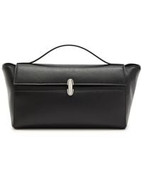SAVETTE - Trapeze Leather Pochette - Lyst