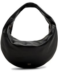 Khaite - Olivia Medium Leather Top Handle Bag - Lyst