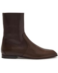 KHAITE - Colt Glossed Leather Ankle Boots - Lyst