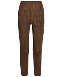 Pleats Please Issey Miyake - Pleated Tapered-Leg Woven Trousers - Lyst