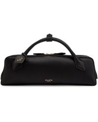 Alaïa - Le Teckel Satin Clutch - Lyst