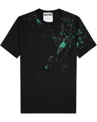Moschino - Paint-splatter Logo-print Cotton T-shirt - Lyst