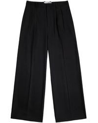 Loewe - Logo-Embroidered Woven Trousers - Lyst