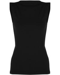 Wolford Sleeveless and tank tops for Women - Up to 79% off | Lyst