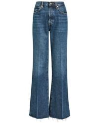 FRAME - The Lax Distressed Flared-Leg Jeans - Lyst