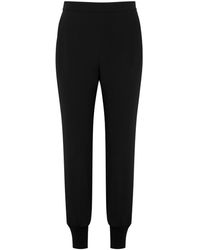 Stella McCartney - Tapered Stretch-crepe Trousers - Lyst