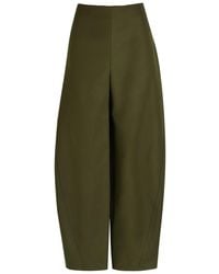 Alaïa - Twisted Barrel-Leg Cotton Trousers - Lyst