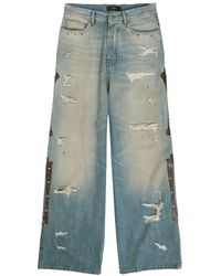 Amiri - Bones Studded Distressed Relaxed Jeans - Lyst