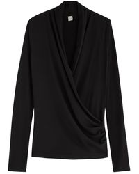 TOTEME - Draped Wrap-Effect Stretch-Jersey Top - Lyst