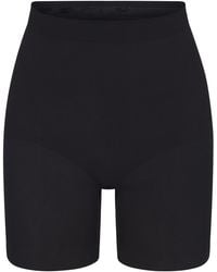 Skims - Seamless Sculpt Mid-Thigh Shorts - Lyst