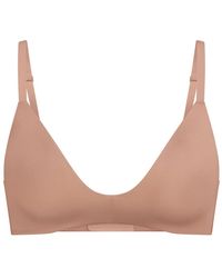 Skims - Wireless Stretch-Jersey T-Shirt Bra - Lyst