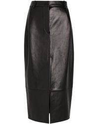 KHAITE - Anden Leather Midi Skirt - Lyst