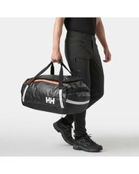 Helly Hansen - Guide Borsone 50L Nero - Lyst