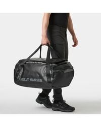 Helly Hansen - Guide Duffel Bag, 90L Std - Lyst