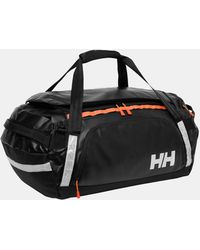 Helly Hansen - Guide Borsone 70L Arancione - Lyst