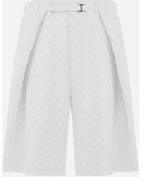 Herno - Globe Cropped Trousers In Photocromatic Monogram - Lyst