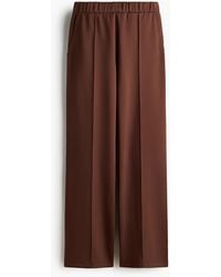 H&M - Crease-front pull-on trousers - Lyst