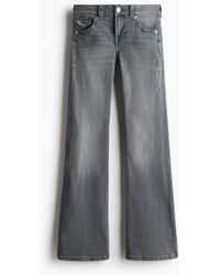 H&M - Flared Low Jeans - Lyst