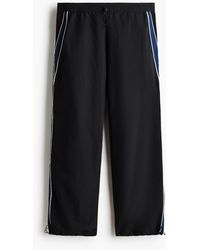 H&M - Trainingshose aus Nylon in Loose Fit - Lyst