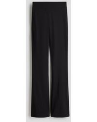 H&M - Flared Four-way Stretch Broek - Lyst