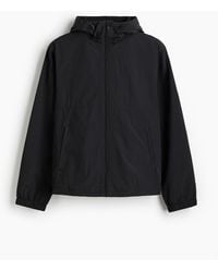 H&M - Windjacke mit Kapuze - Lyst