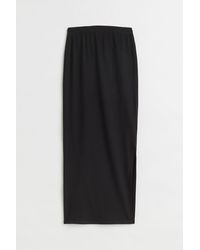 Damen Bekleidung Röcke Mittellange Röcke H&M Synthetik MAMA Gerippter Jerseyjupe in Schwarz 