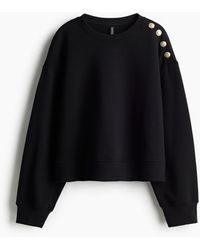 H&M - Sweatshirt mit Knopfdetail - Lyst