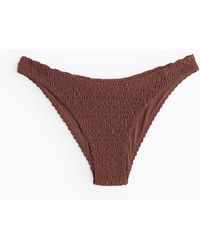 H&M - Smocked bikini bottoms - Lyst