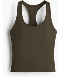 H&M - Sporttop mit integriertem BH und DryMoveTM - Lyst