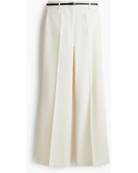 H&M - Flared Broek Met Ceintuur - Lyst