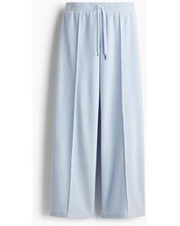 H&M - Pantalon jogger large en velours - Lyst