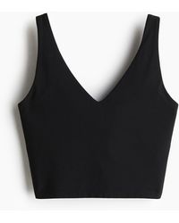 H&M - Yoga-BH mit SoftMoveTM Lycra® Light Support - Lyst
