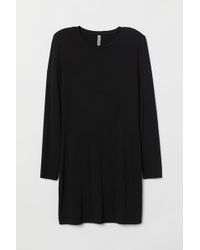 H&M Kleid mit Schulterpolstern - Schwarz