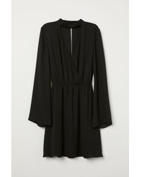 H&M Wickelkleid mit V-Ausschnitt - Schwarz