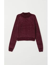 A.W.A.K.E. Verkürzter Oversized Pullover aus Wolle mit A.W.A.K.E. Verkürzter Oversized Pullover aus Wolle mit