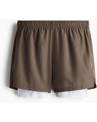 H&M - Doppellagige Sportshorts mit DryMoveTM - Lyst