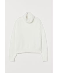 h&m white fuzzy sweater
