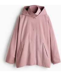 H&M - Regenjack Met Stormmovetm - Lyst