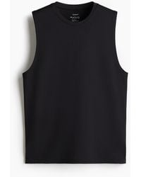 H&M - Sport-Tanktop mit DryMoveTM in Regular Fit - Lyst