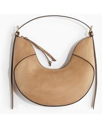 H&M - U-förmige Umhängetasche - Lyst
