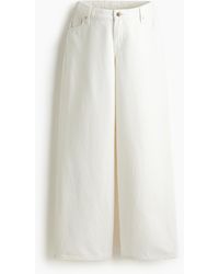 H&M - MAMA Before & After Weite Jeans - Lyst