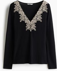 H&M - Ribgebreide Top Met Kant - Lyst