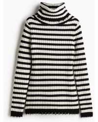 H&M - Gerippter Wollpullover mit Rollkragen - Lyst