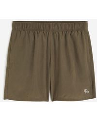 H&M - Short de sport tissé DryMove avec poches - Lyst