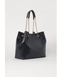 H&M Shopper mit Schlangenmuster - Schwarz