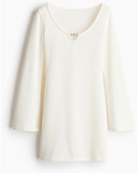 H&M - Ausgestelltes Strickkleid - Lyst