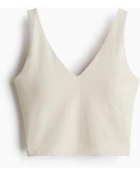 H&M - Yoga-BH mit SoftMoveTM Lycra® Light Support - Lyst